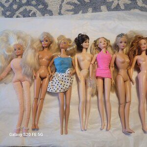 Seven Vintage 1990's Barbie Dolls